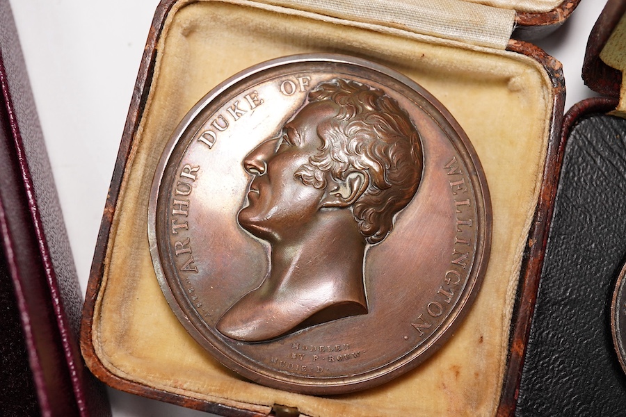 Four 19th/20th century commemorative medals; Wellington, Commander-in-Chief of the Army, 1827, a copper plated medal by J. Henning, Arthur Duke of Wellington prize medal, by Thomason, a Blucher soft metal medal, by Halli